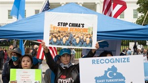 FILE - East Turkistan Awakening Movement holds a rally outside the White House against the Chinese 